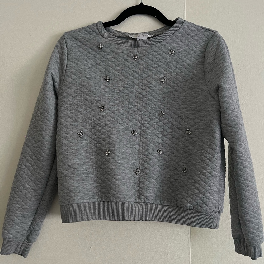 Switshot, cardigan. Sweater.